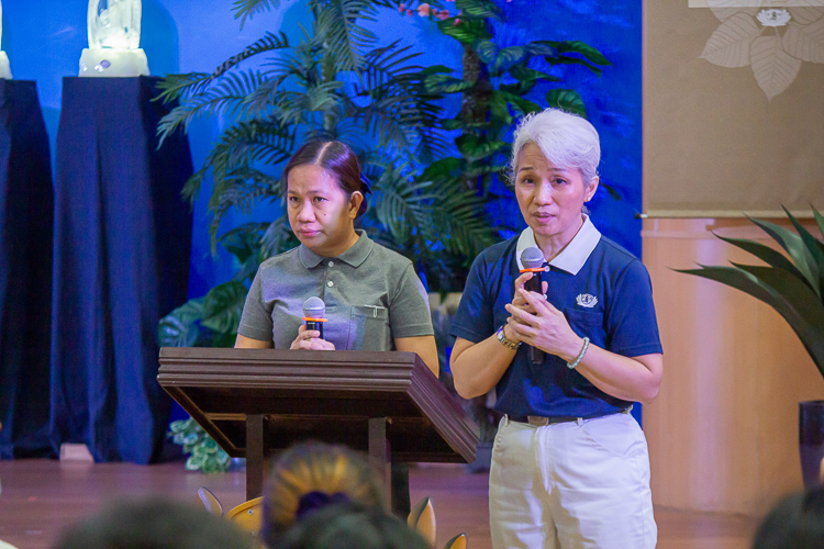 Tzu Chi volunteers Julie Collado (left) and Levy Yao serve as hosts of the March 24 Quarterly Charity Day. 【Photo by Marella Saldonido】