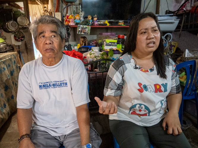 Former tricycle driver Gene Oquenda (left) was in a coma for two weeks and confined in a government hospital for over two months following a stroke 14 years ago. “We all love and took care of him, but he had the will to live,” says Janice (right). 【Photo by Matt Serrano】