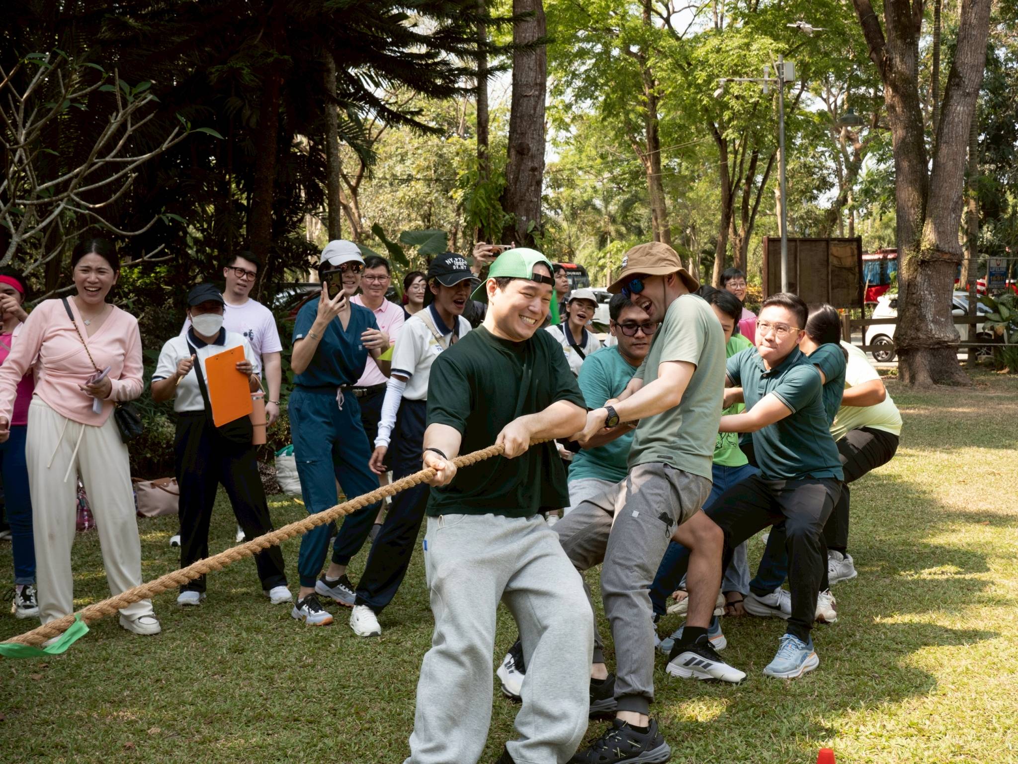 Parent teams give their best effort during the exciting tug-of-war portion of the games.