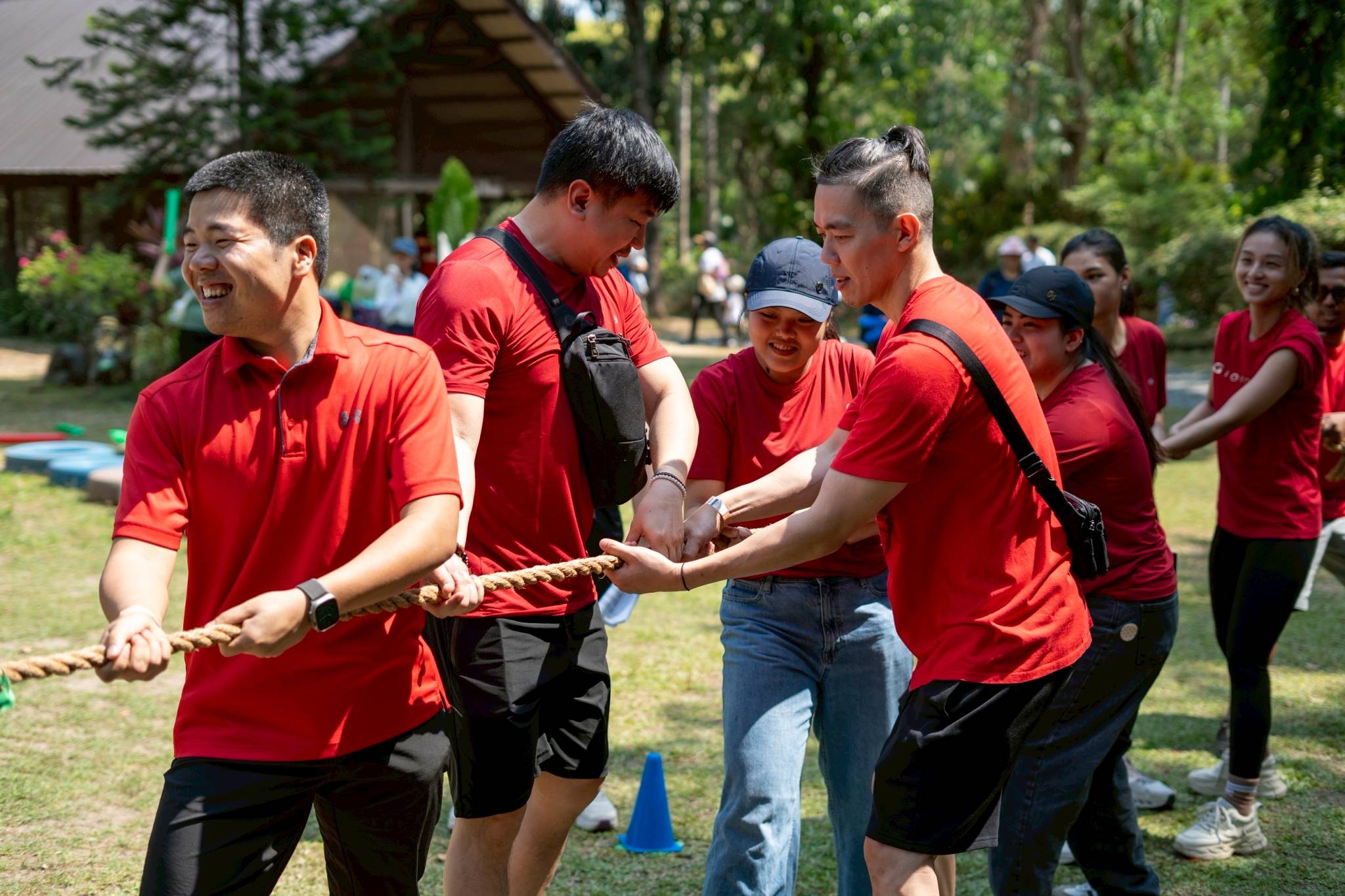 Parent teams give their best effort during the exciting tug-of-war portion of the games.