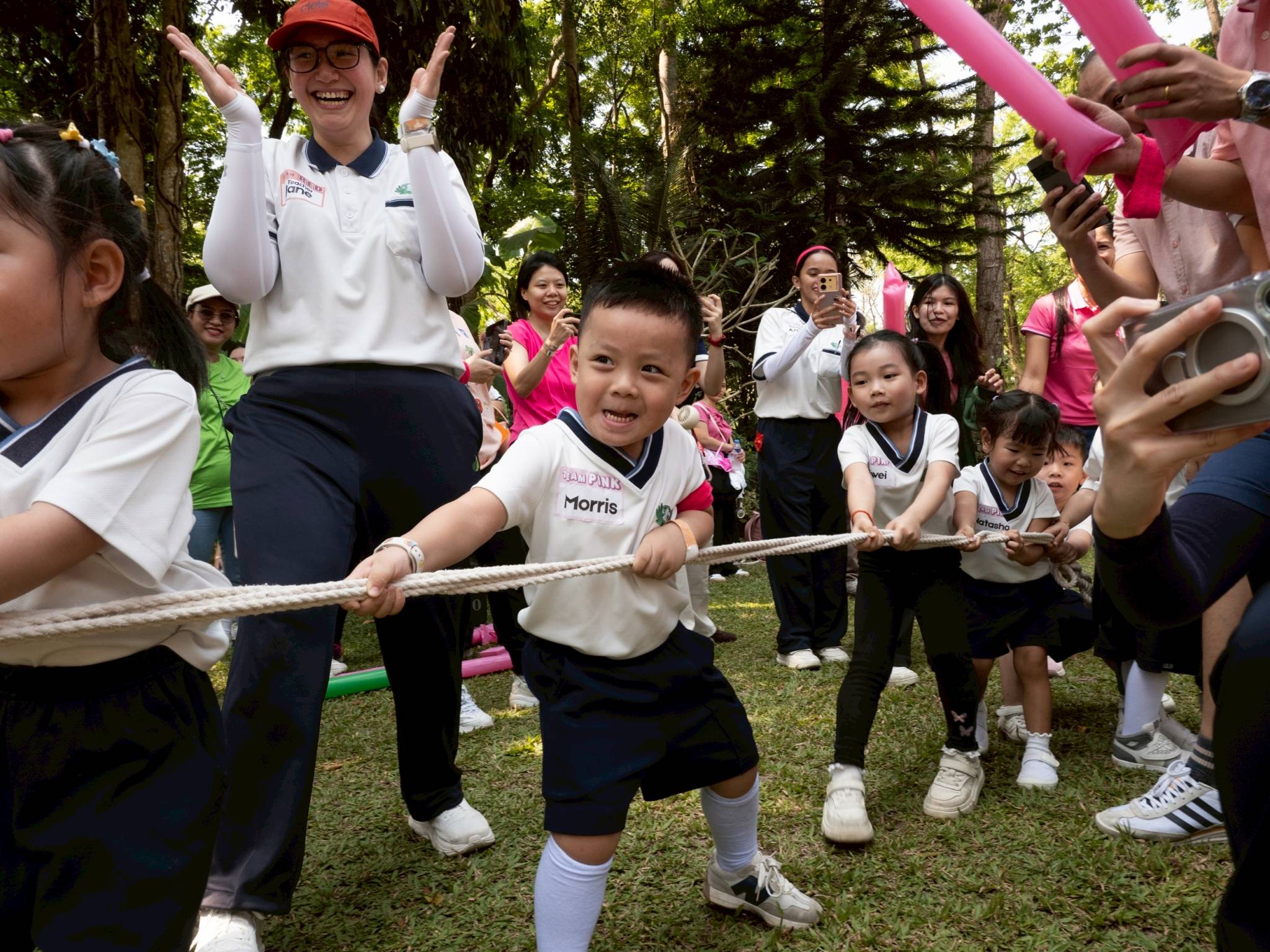 With the support of their parents and guardians, preschool gave their all in their  tug-of-war game.
