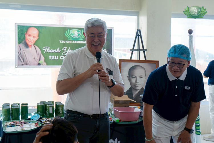 Dr. Josefino “Jo” Qua (left), and Dr. Anton Mari Lim (right) give comfort and positive words to patients after their surgery.