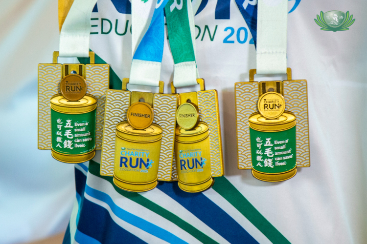 The 2025 Tzu Chi Charity Run features an all-new medal, with Tzu Chi’s iconic coin can and movable coin bearing this run’s logo.