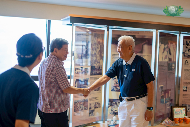 Tzu Chi Philippines CEO Henry Yuñez (right) is welcomed by Angelo King Foundation, Inc. (AKFI) President Teddy Kingsu at the AKFI office in King's Court 1 Bldg., Chino Roces Avenue, Makati.