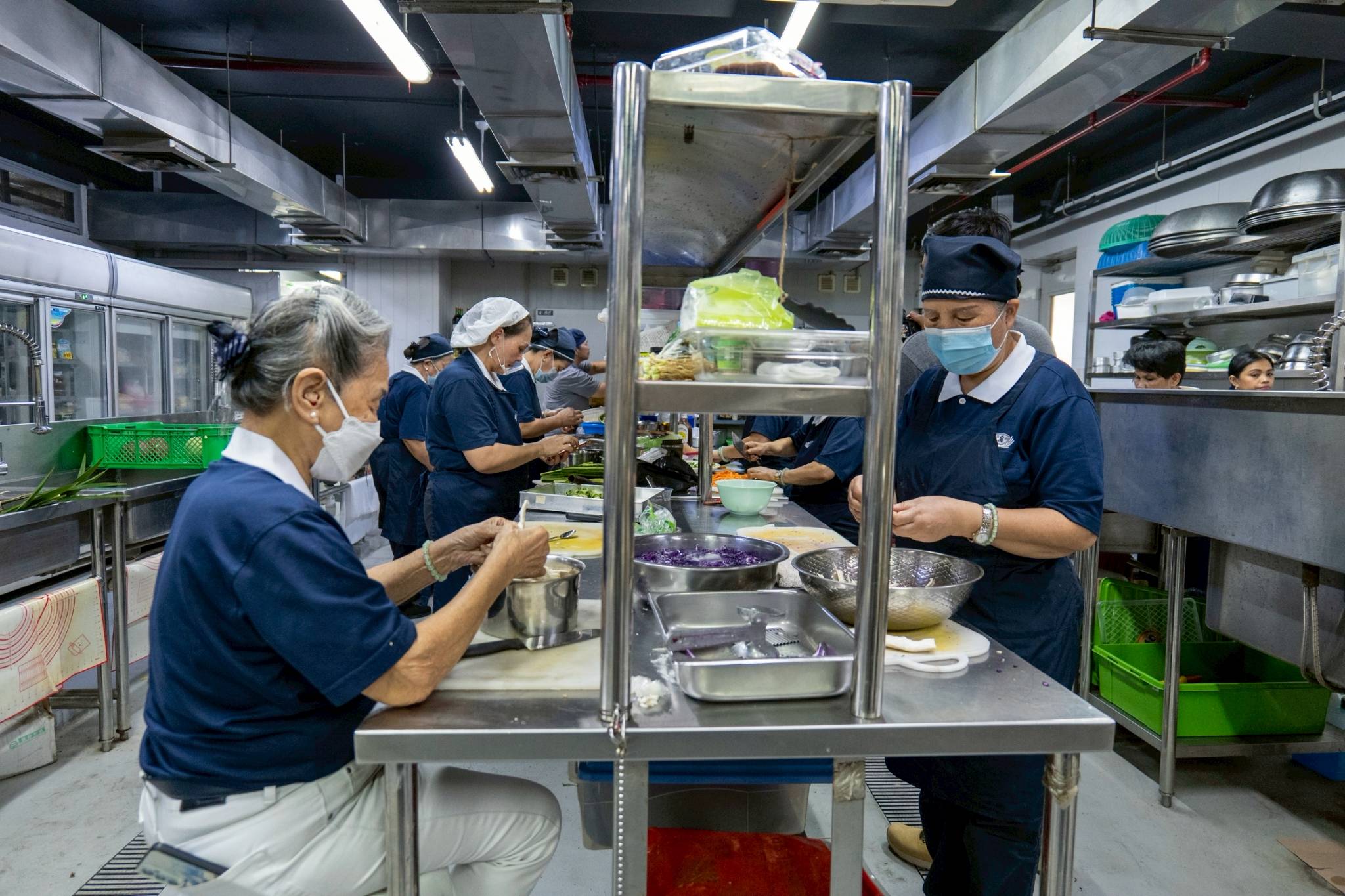 Preparations for the Lantern Festival dinner began early with volunteers putting ingredients together for a vegetarian buffet. 