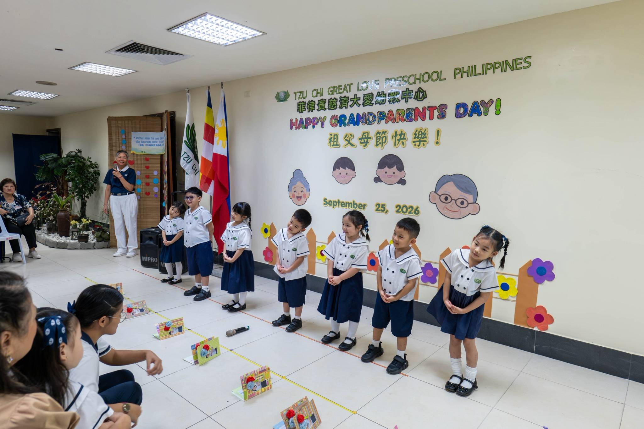 The kindergarten class filled the stage with fun and energy during their lively performance.