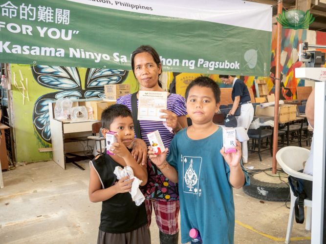For Mae Matabaran, receiving relief and free medicine for her children was a great blessing.