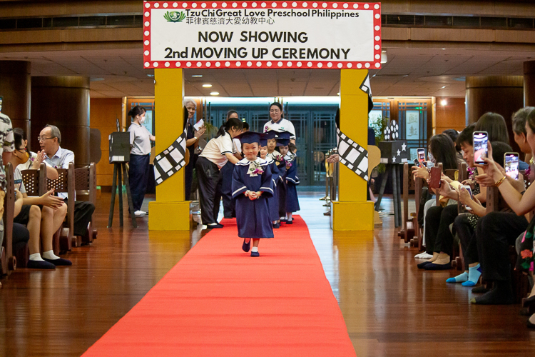 In this moving up ceremony, 15 students advance from pre-kindergarten to kindergarten.