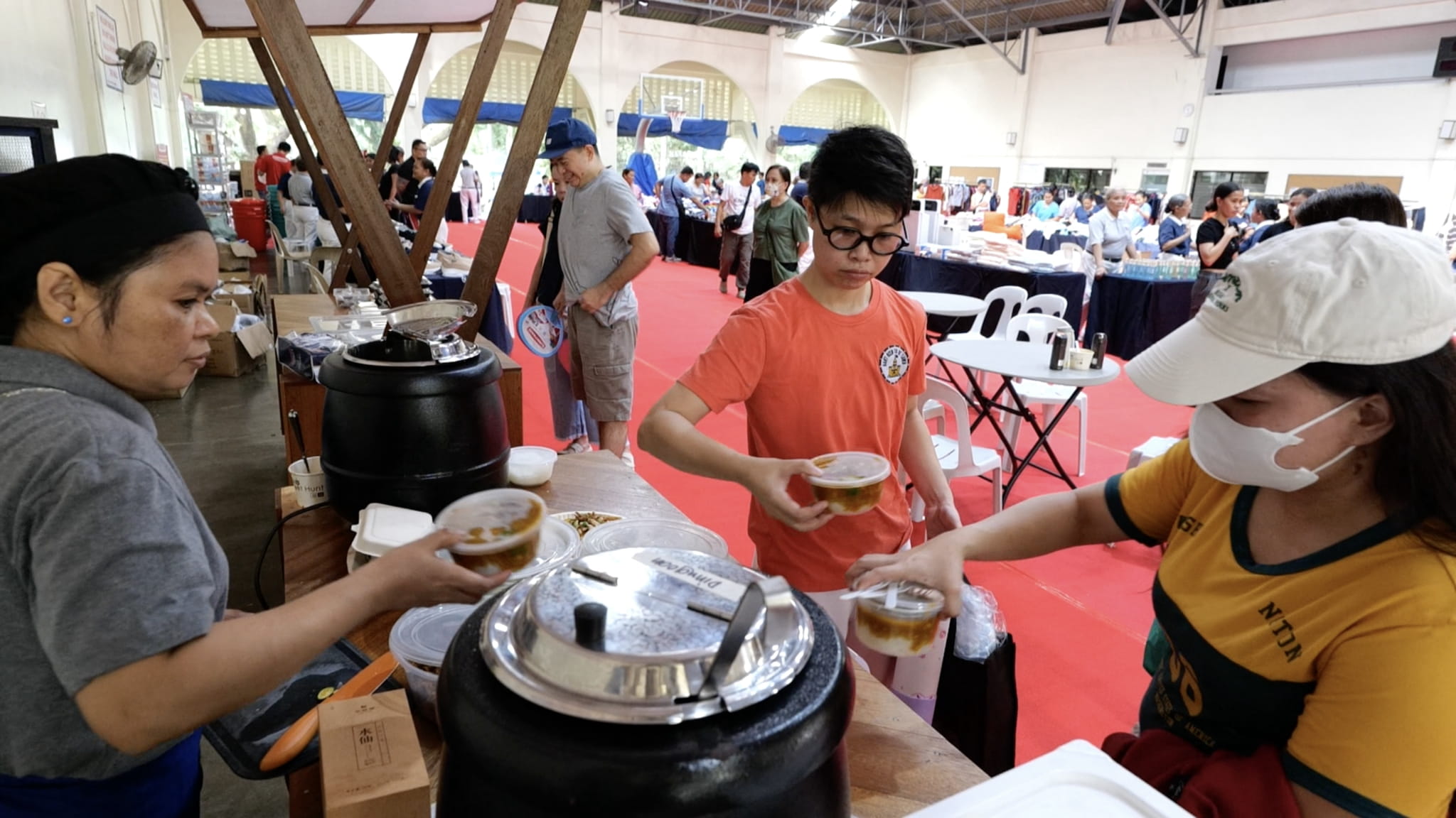 Shoppers indulge in vegan treats after shopping. 