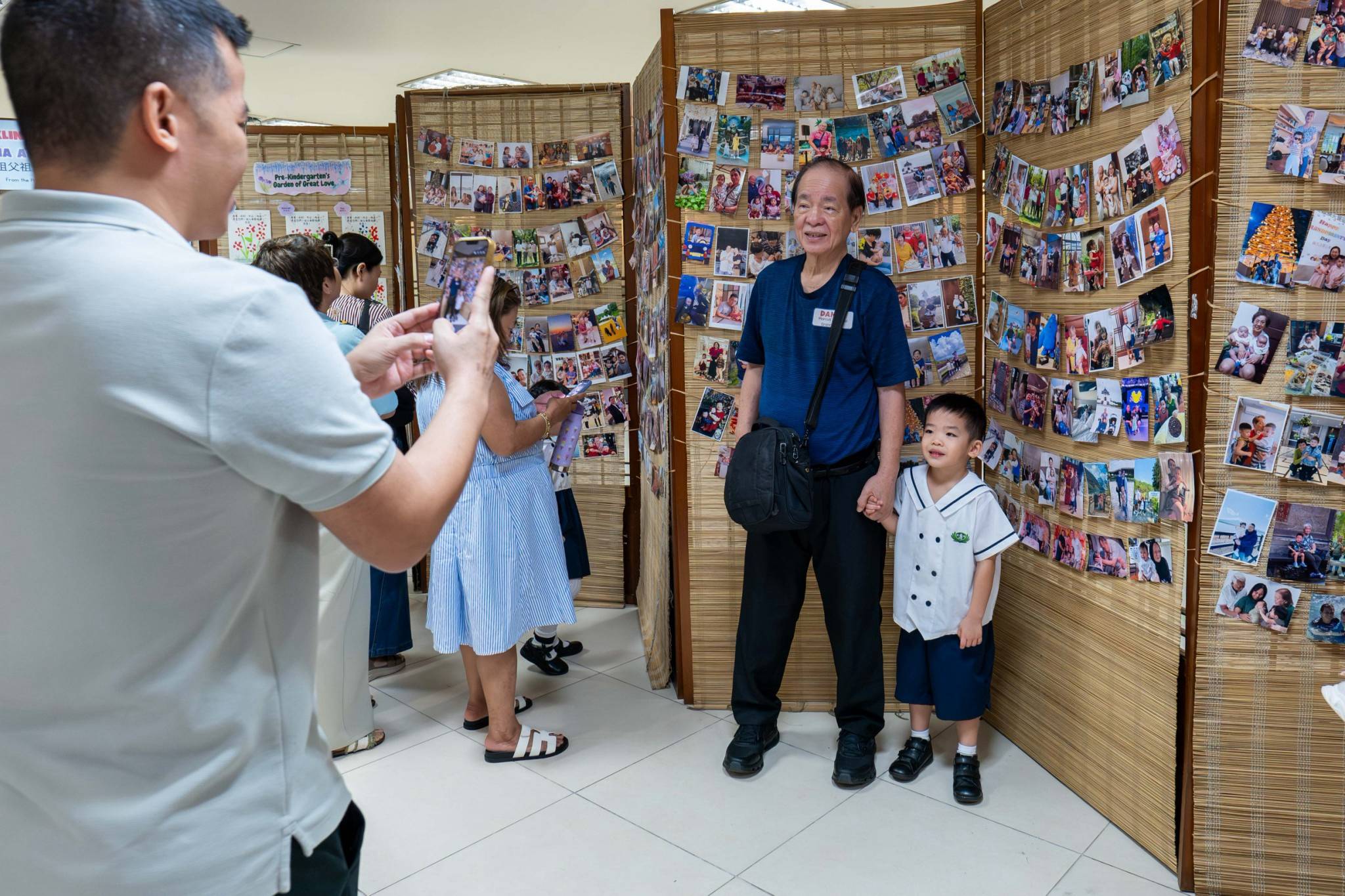 Parents gave way for the grandparents to enjoy the special moment with their grandchildren.