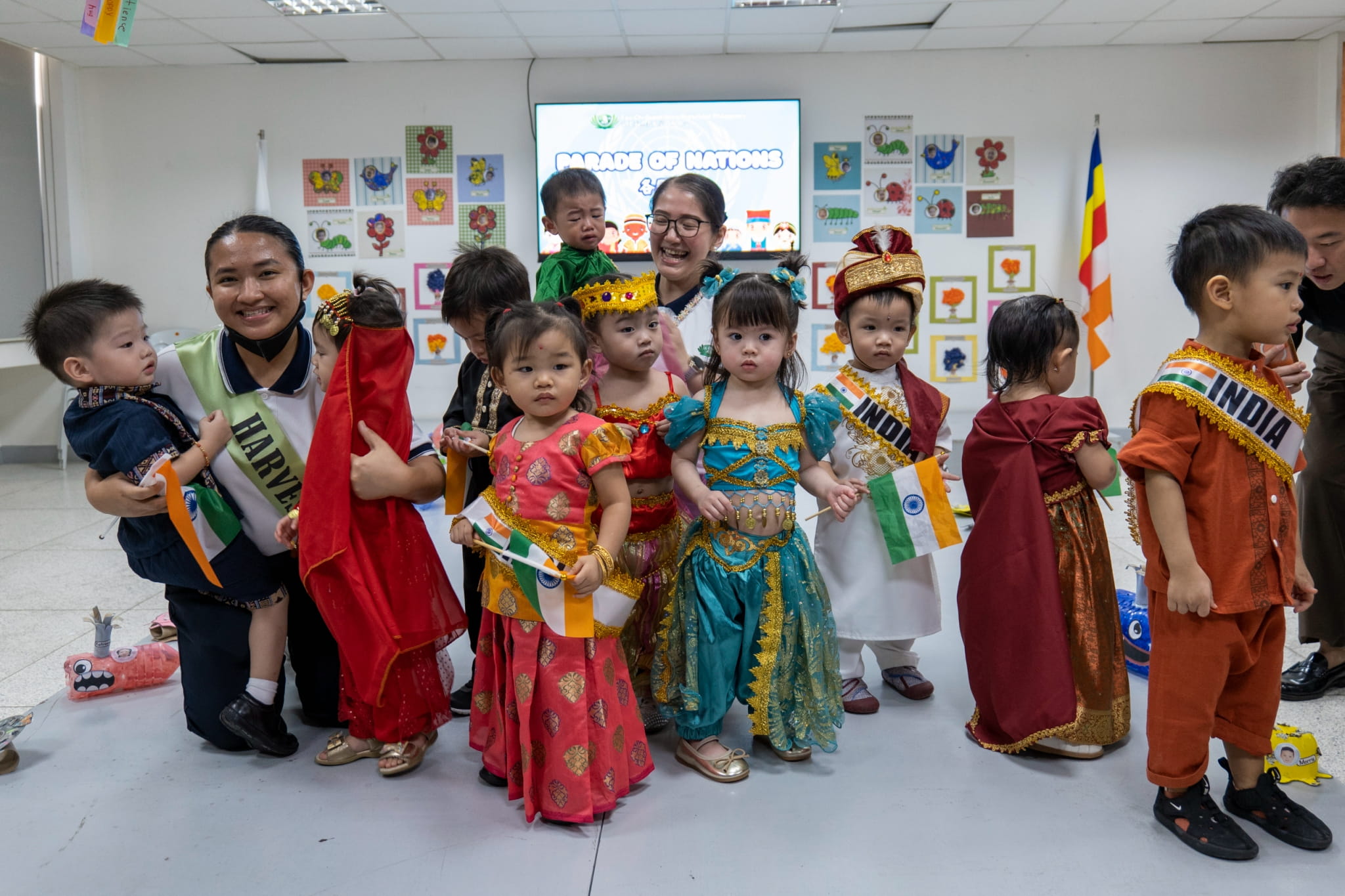 The junior nursery’s little representatives of India pose for a group photo after their parade.