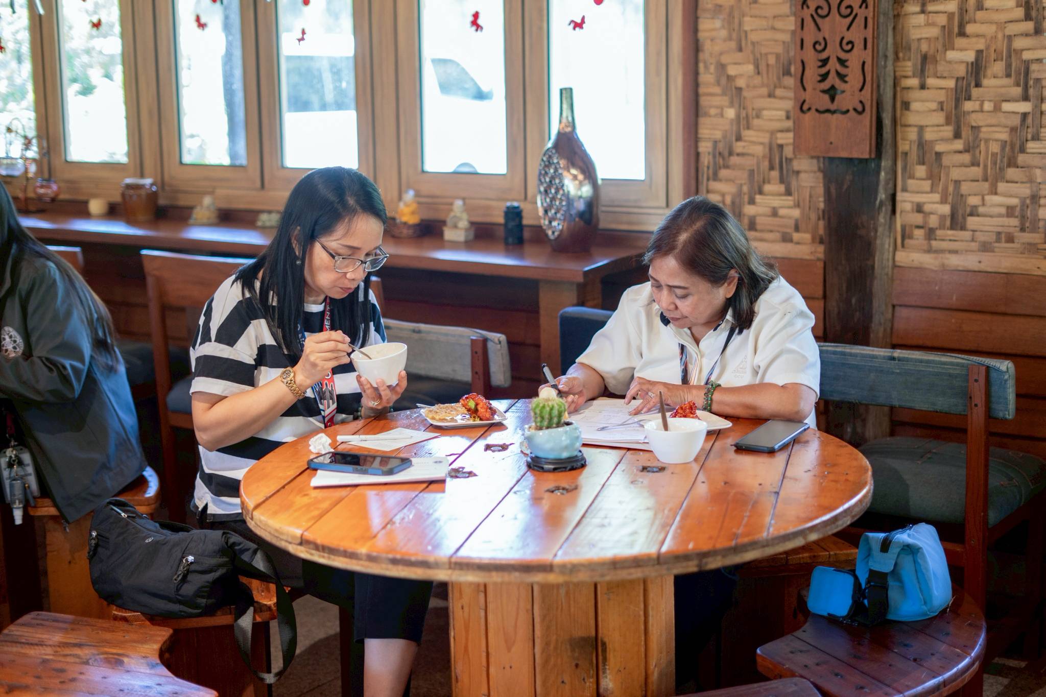 The attendees from Quezon City University took their time evaluating the food, with some being particularly attentive to taste, texture, and finish.