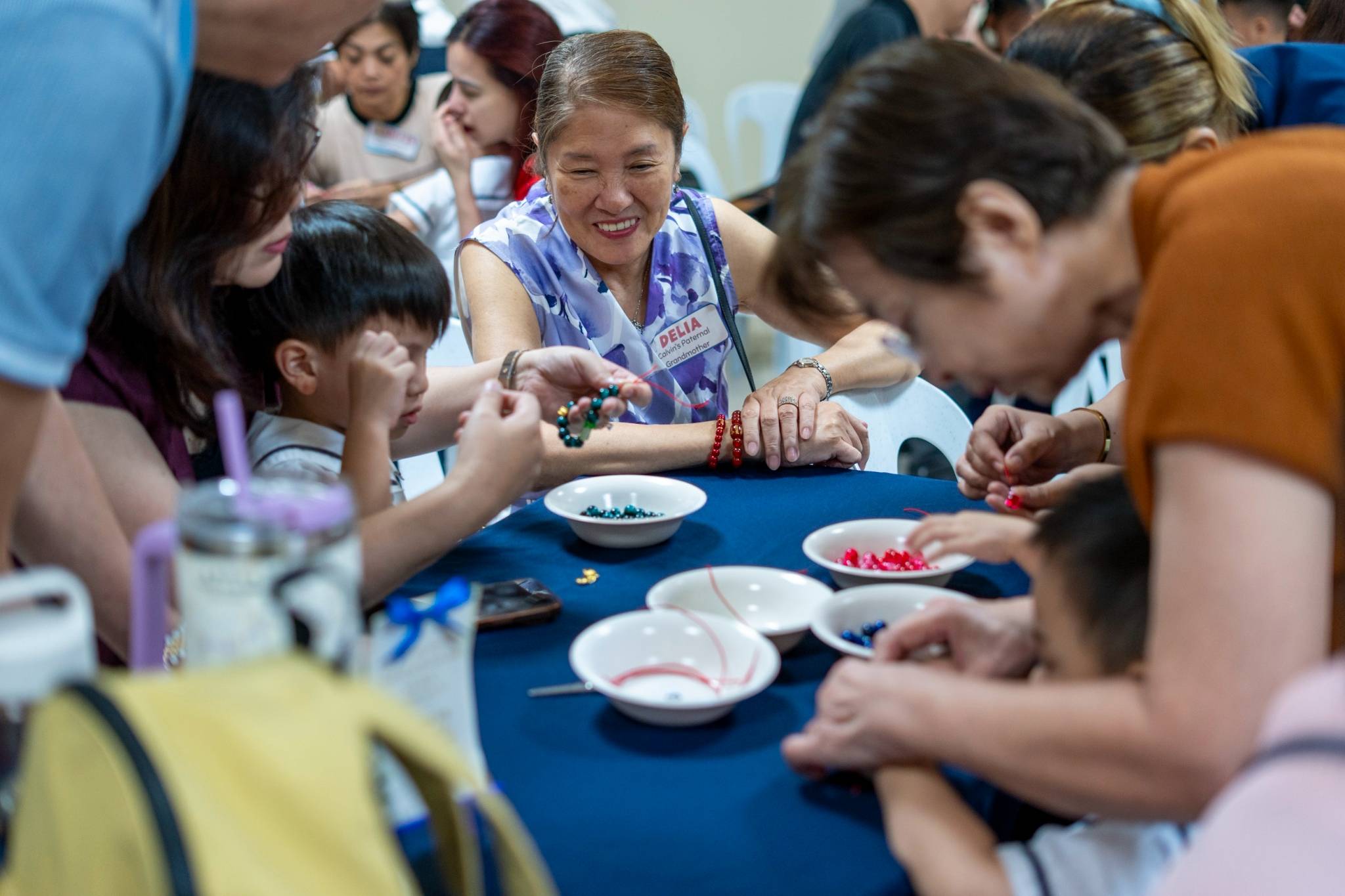 Grandparents enjoyed choosing their favorite colors for their bracelets.