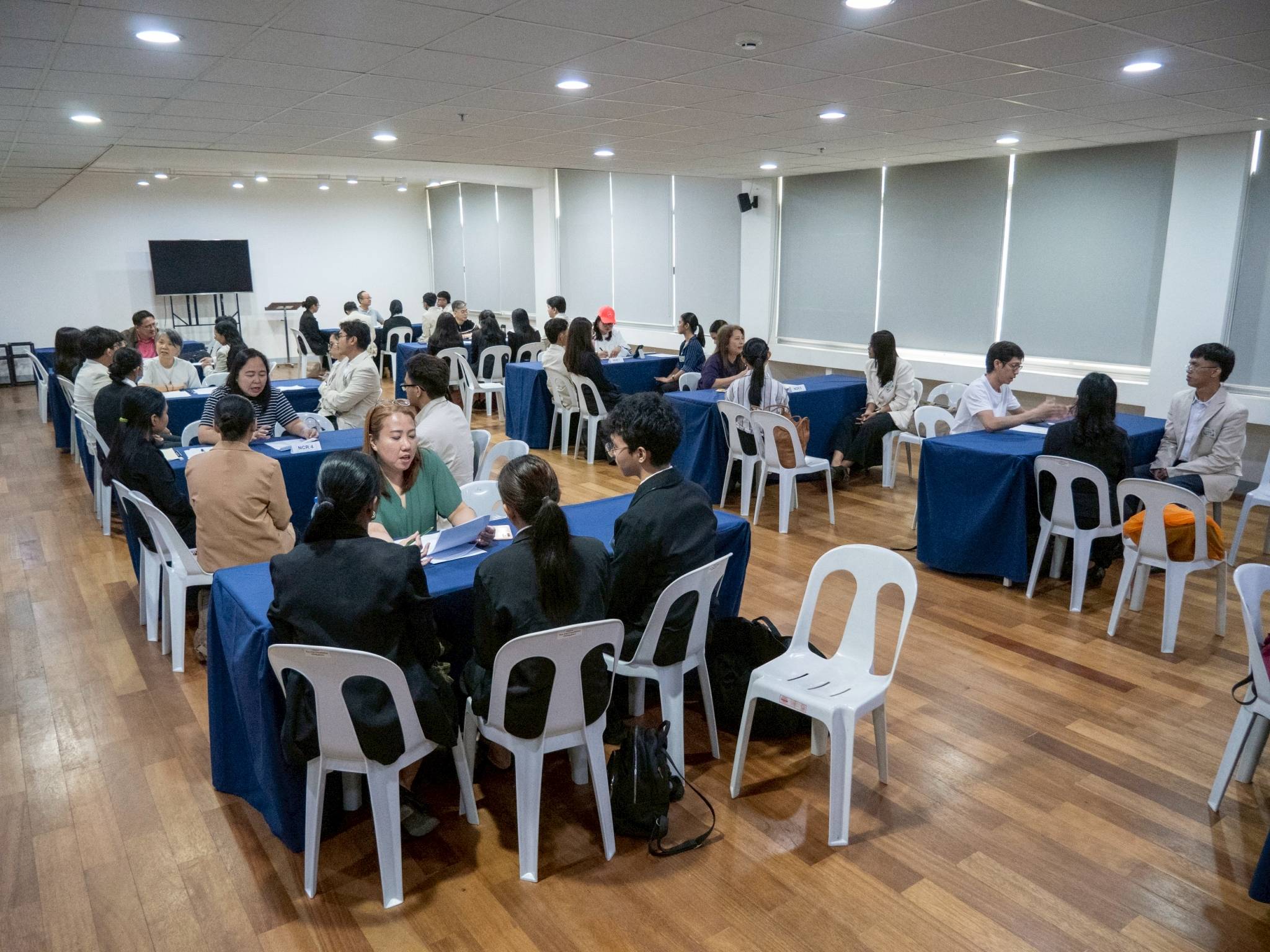 The room came alive as mock interviews started, with each interviewer engaging three to five scholars.