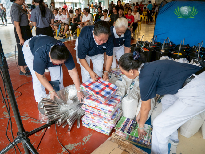 Volunteers prepare the relief items.