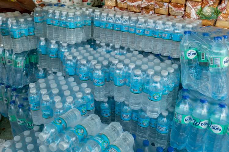 With the loss of resources, beneficiaries were in great need of clean, drinkable water. Volunteers came with cases of bottled water. 