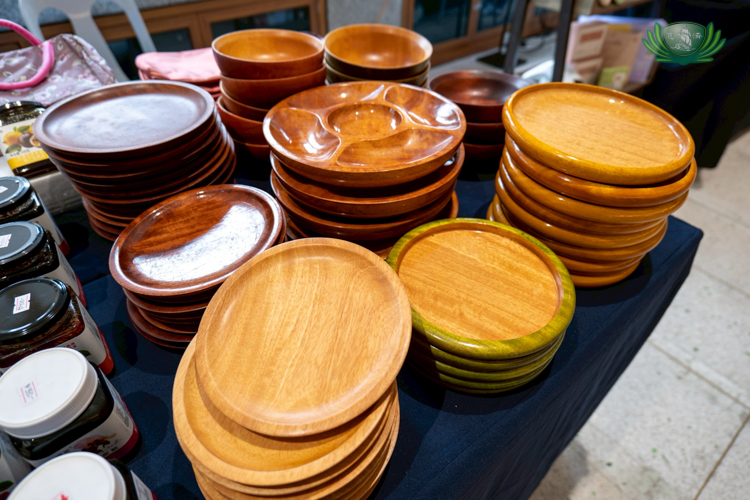 For the family member or friend who likes to host at home: wooden plate holders and servers.