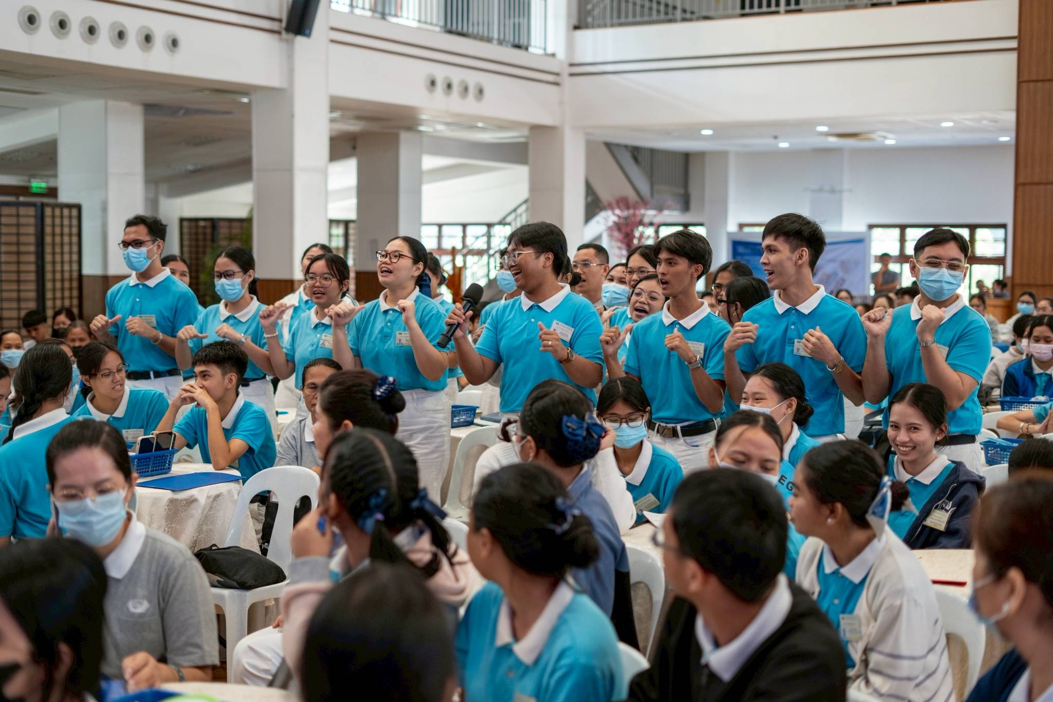 Tzu Chi scholars take turns performing their advocacy chants. 