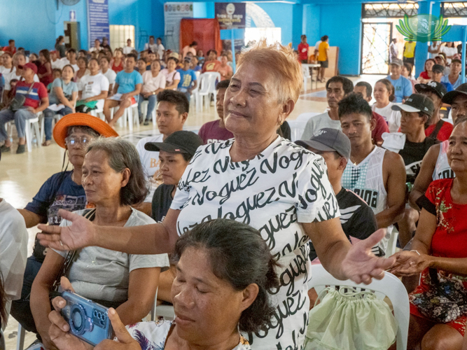 A resident joins the performance with visible joy and enthusiasm.