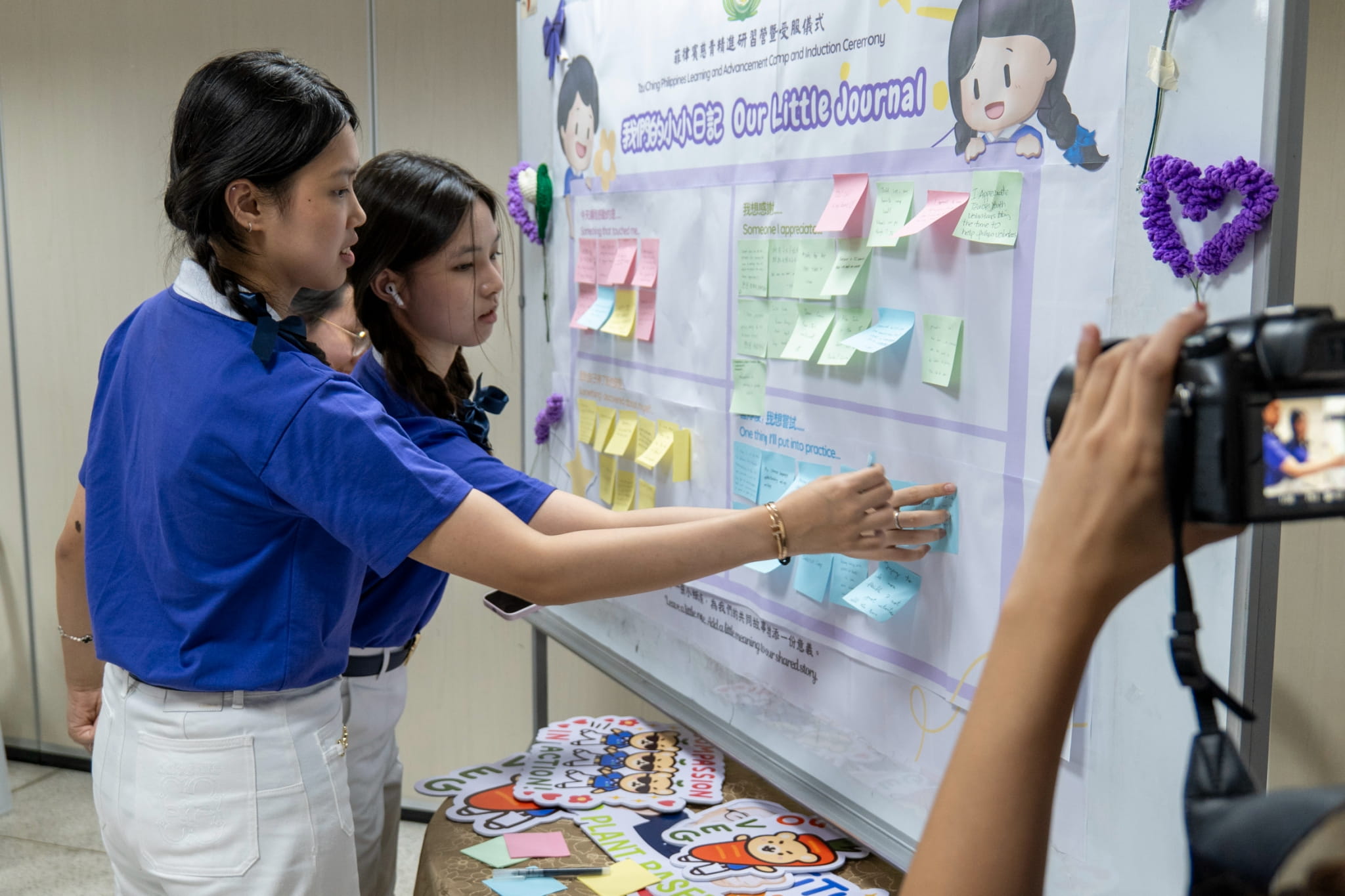 A white board “journal” invites TCY inductees and members to post their reflections.