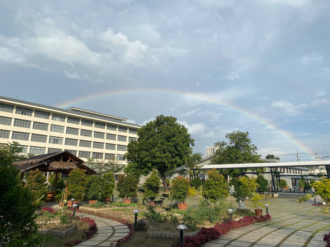 The reunion ends with an auspicious sign: a rainbow in the sky.
