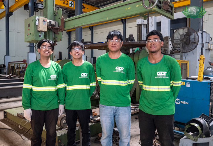 Gerald Seciban (first from left) with his fellow Tzu Chi Technical-Vocational scholars during their on-the-job training in Greenpower Technology Services.