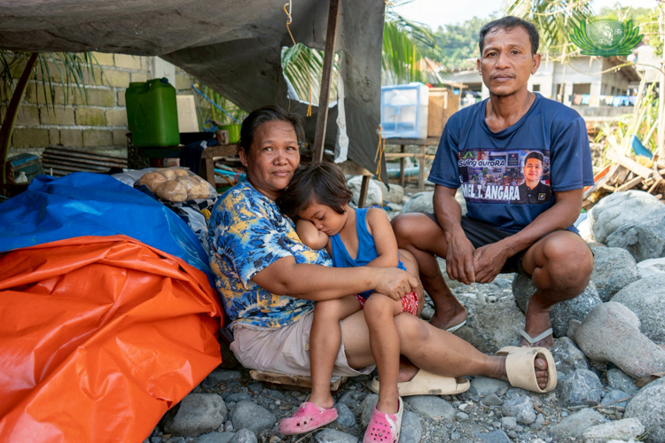 Fisherman Dennis Roldan and his family consider their next moves after Typhoon Uwan completely destroyed their home and livelihood.