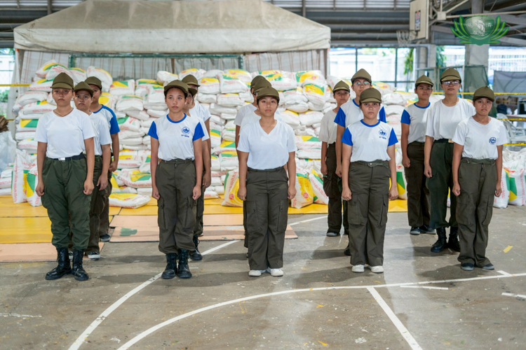 Student volunteers from Sisters of Mary Girlstown stand ready to support the relief distribution.