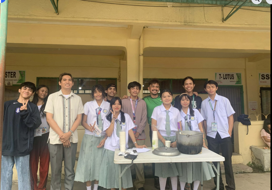 With Kids Who Farm, Gin Gigaquit (back row, third from right) monitored their City Green Pockets project at Agusan National High School. “We provide free arroz caldo to the students and encourage project participants to volunteer giving out free food,” he says.