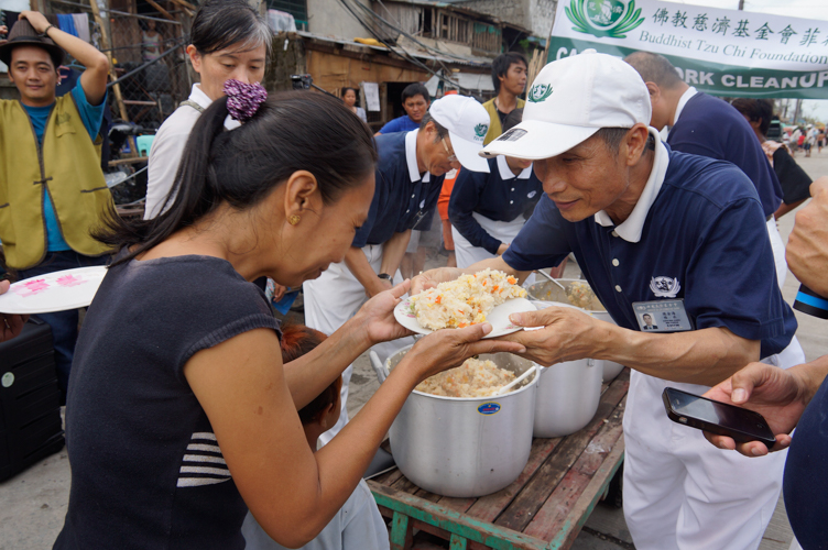 From “Remember Yolanda”: Hot meals were provided to survivors of Yolanda.