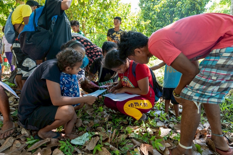 While some Indigenous Peoples were busy eating, others were filling out registration forms before heading to the lines in the medical mission venue.