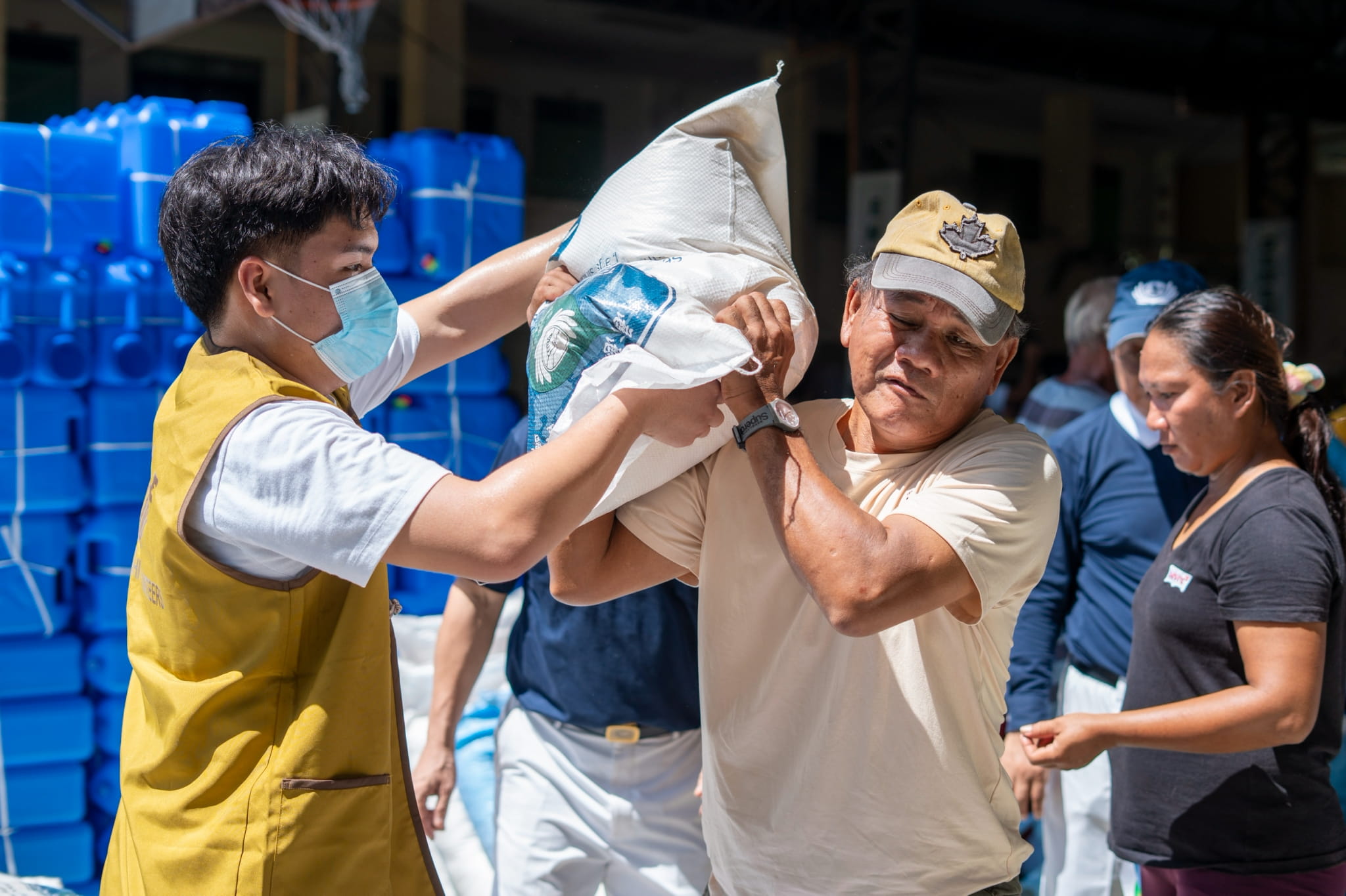 Some beneficiaries were surprised to find themselves carrying home 20 kilograms of rice along with the other relief items.
