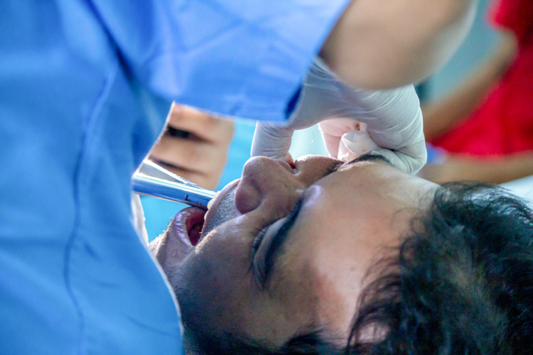 Tooth extraction is also one of the free dental procedures offered during the medical mission. 【Photo by Marella Saldonido】