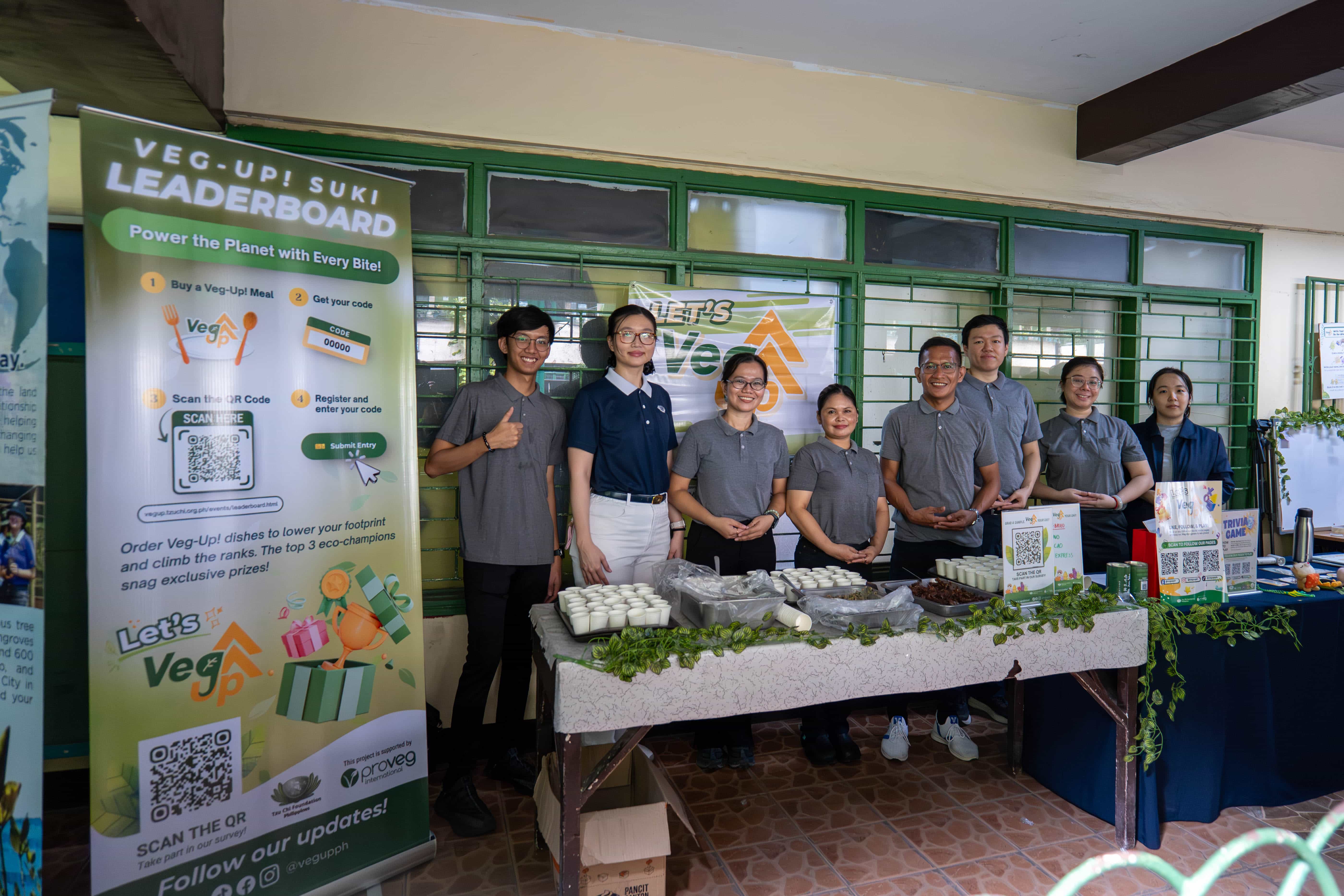The Veg-Up! team poses for a group photo during the preparations for the booth ahead of the school’s club fair.