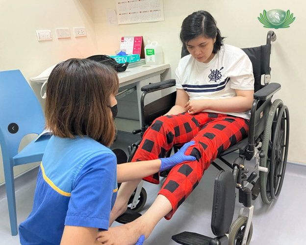 Rica Serrano prepares for her Ankle Foot Orthosis casting at University of the East Ramon Magsaysay (UERM) Memorial Medical Center.