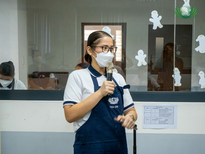 Tzu Chi Great Love Preschool Philippines Directress Jane Sy greets parents and students as she opens the program, emphasizing the project’s cause: to support the construction of Tzu Chi General Hospital. 