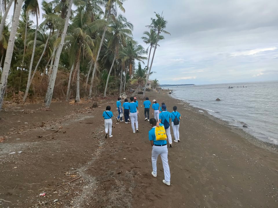 Scholars personally delivered repacked rice to families in the nearby coastal barangays. 