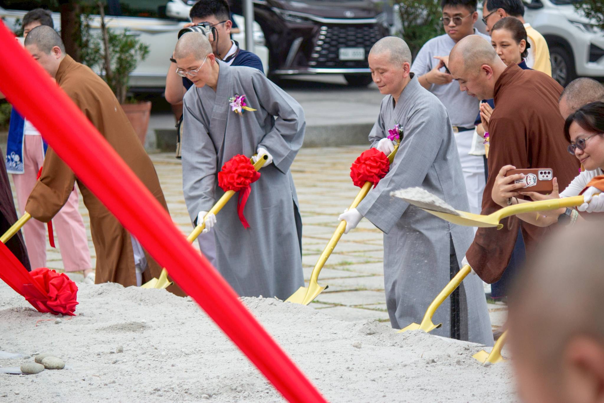 Everybody was invited to participate in symbolic shoveling at the groundbreaking site.