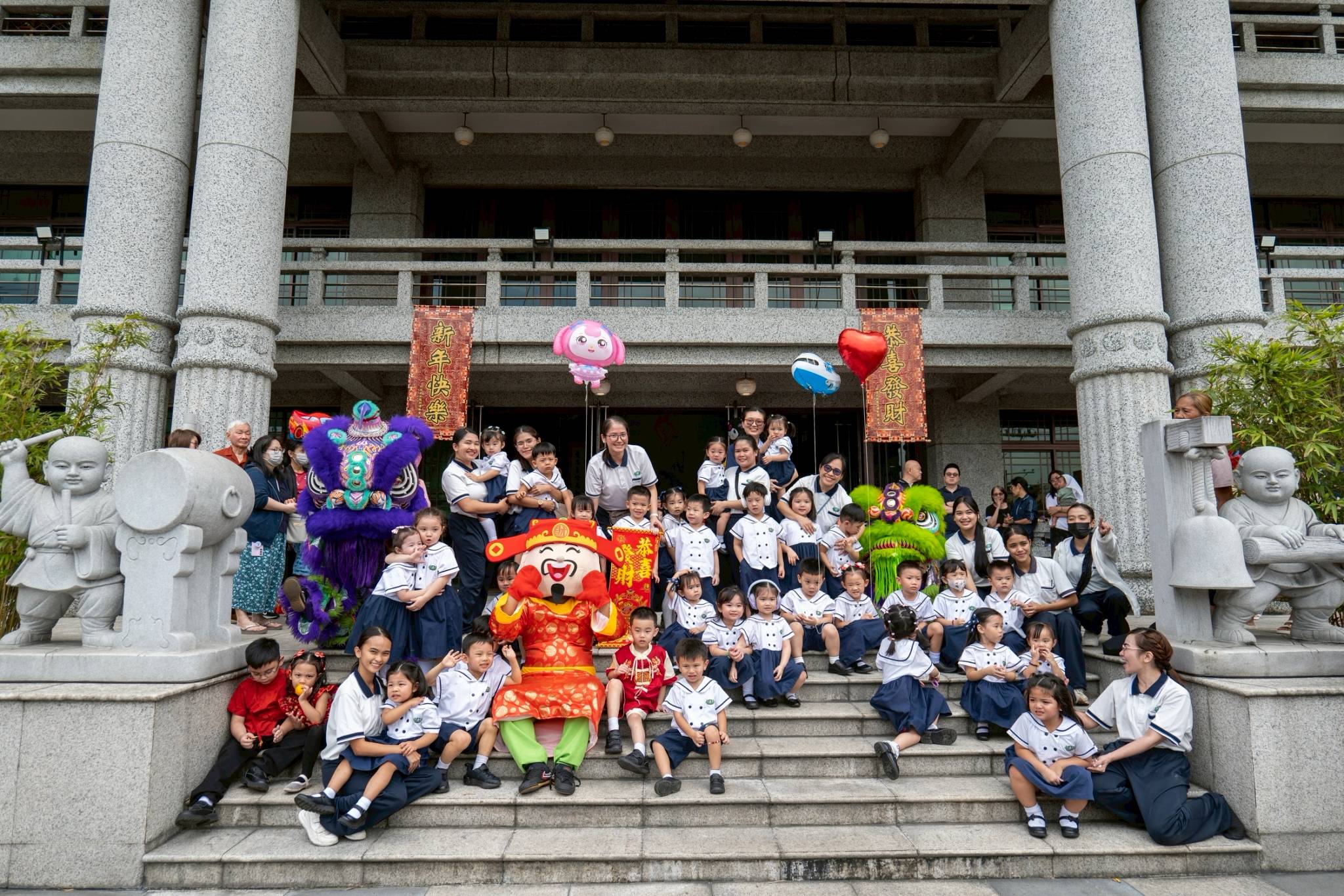To conclude the festivities, everyone gathered for a group photo to commemorate the celebration.