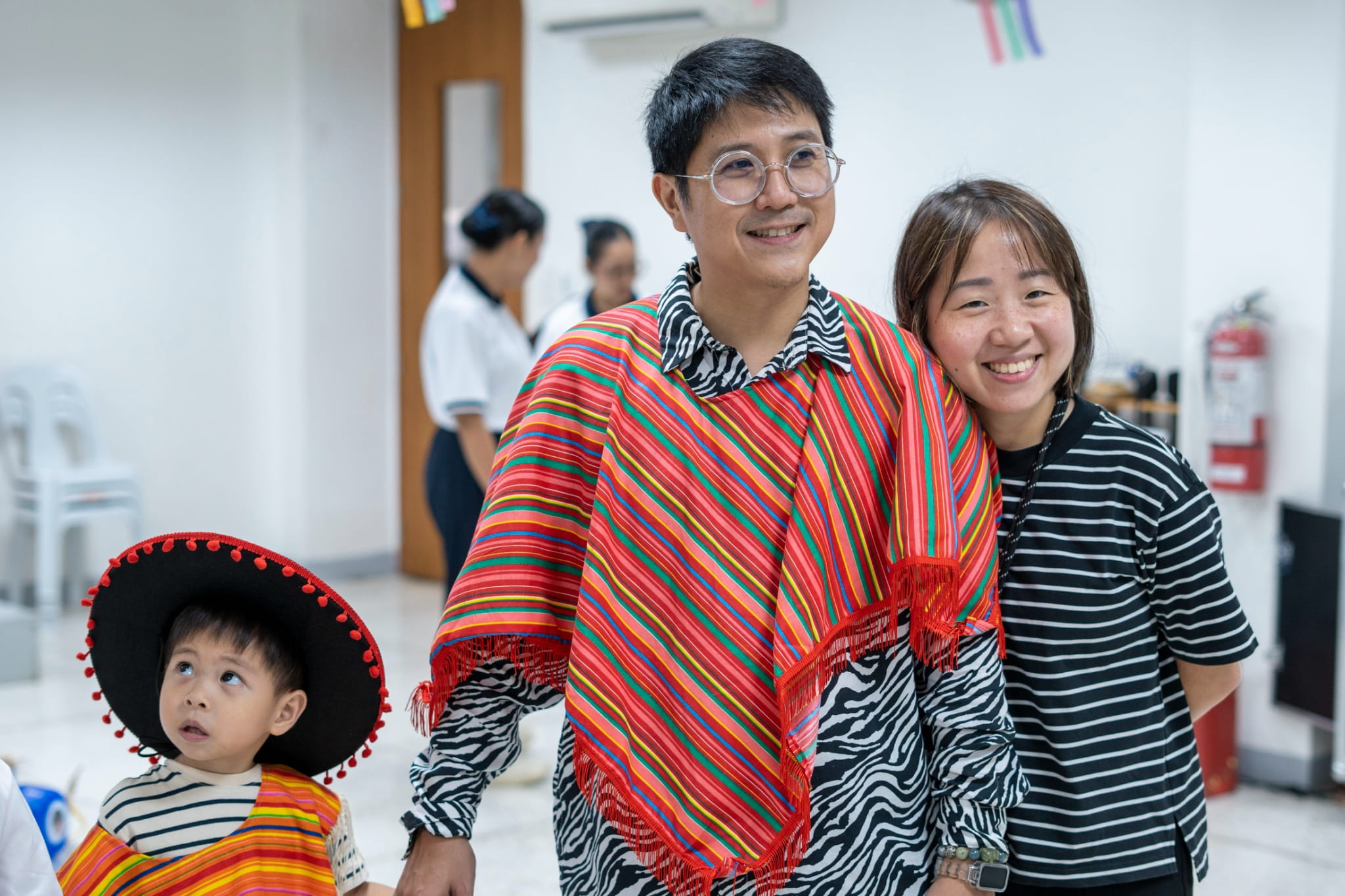 Harold Lim (center ) embraces the Mexican theme as he joins his son Gimm in the game, aiming for extra points while enjoying the fun-filled activity.