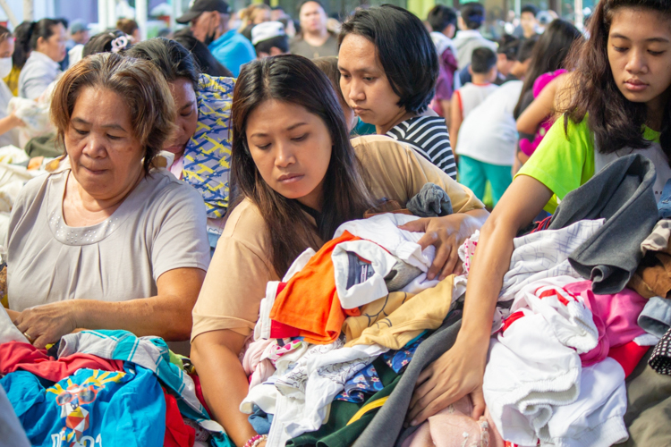Many customers also enjoy rummaging through different clothing options at the bazaar. 【Photo by Marella Saldonido】