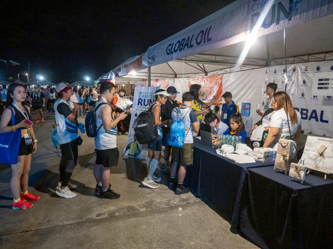 Sponsor booths drew long lines of runners eager to enjoy the freebies and giveaways.