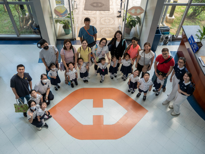 Excited preschoolers flash bright smiles as they enter the LRTA Line 2 Depot, marking the beginning of their experiential learning activity through Philippines’ rail system.