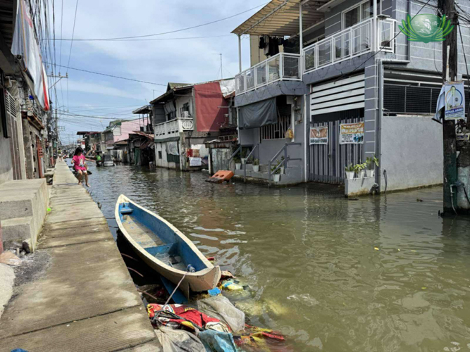 Residents have grown used to the flooding, walking through waters despite the risk of illness. 