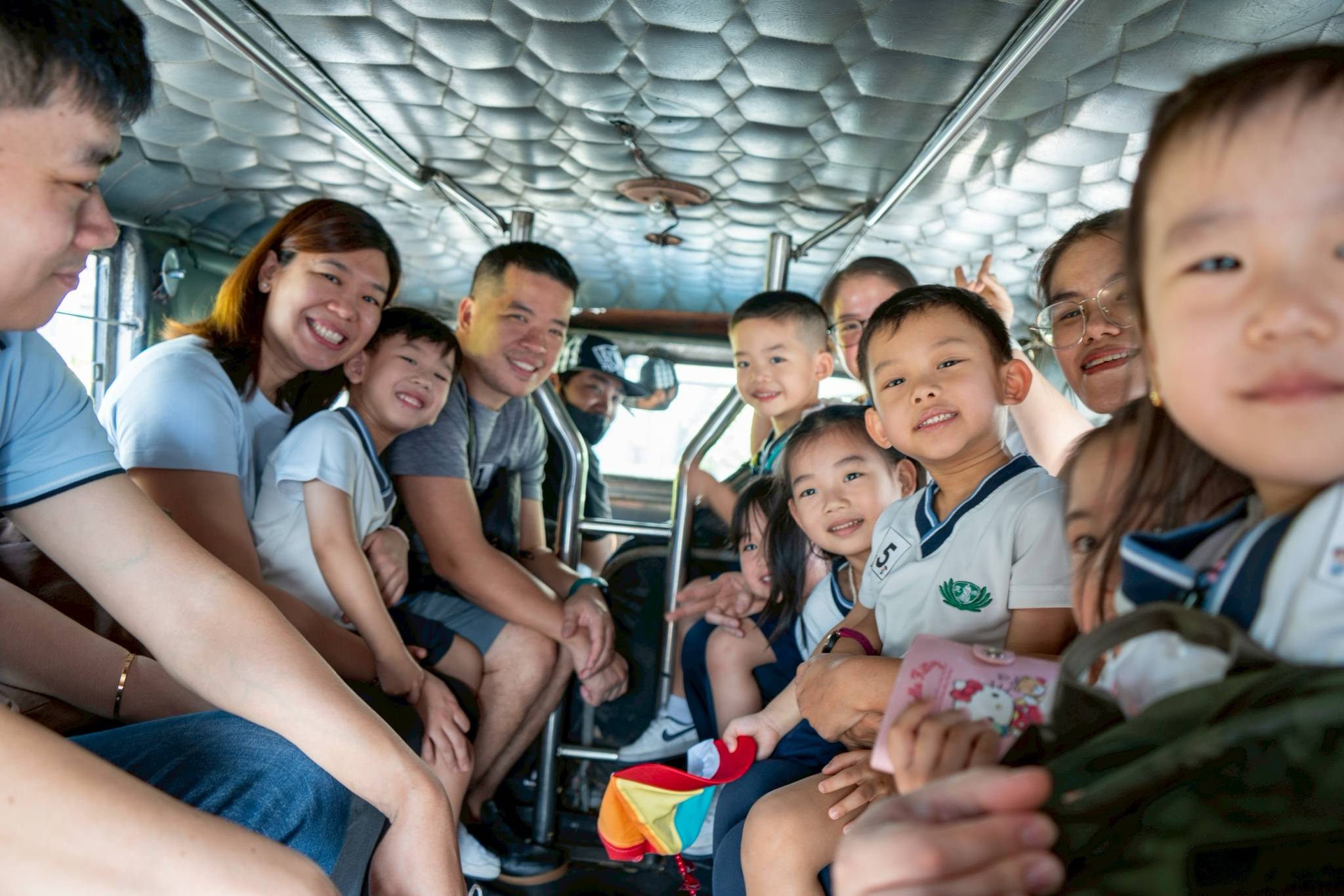 The group sets off from the school, and smiles and anticipation are seen all around.