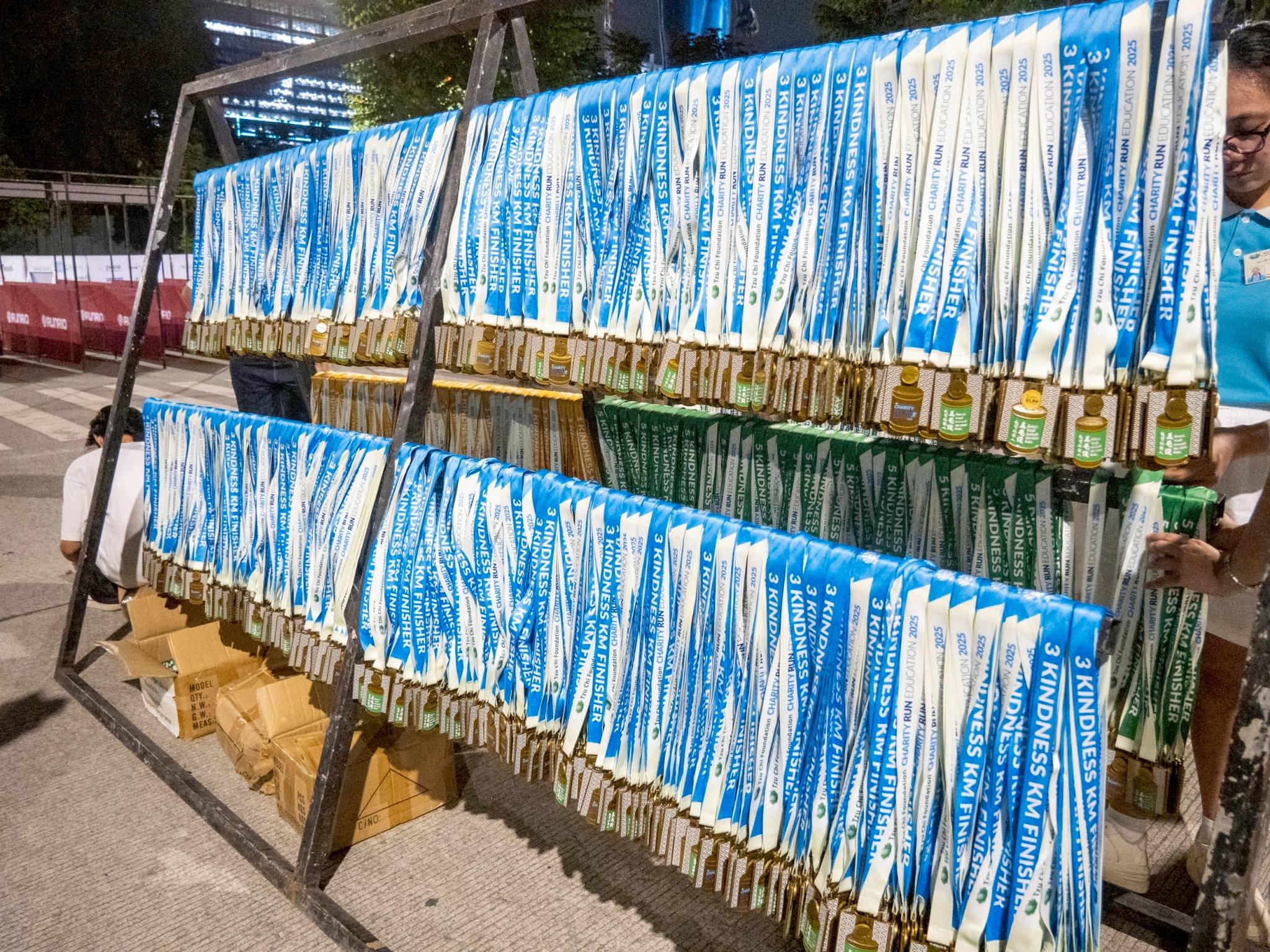 Medals were neatly arranged at the finish line, ready to be awarded to participants. 