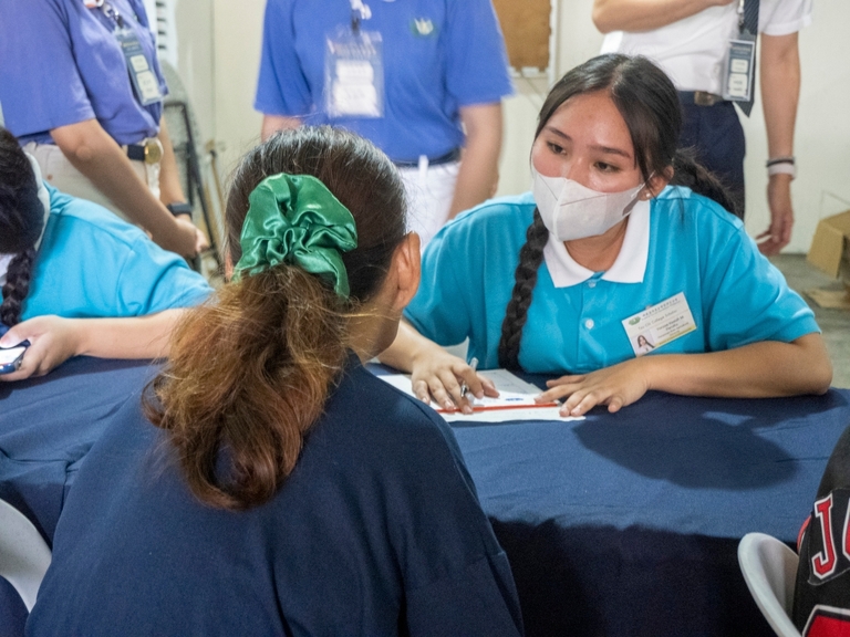 Tzu Chi Pampanga scholars assisted patients with the registration.