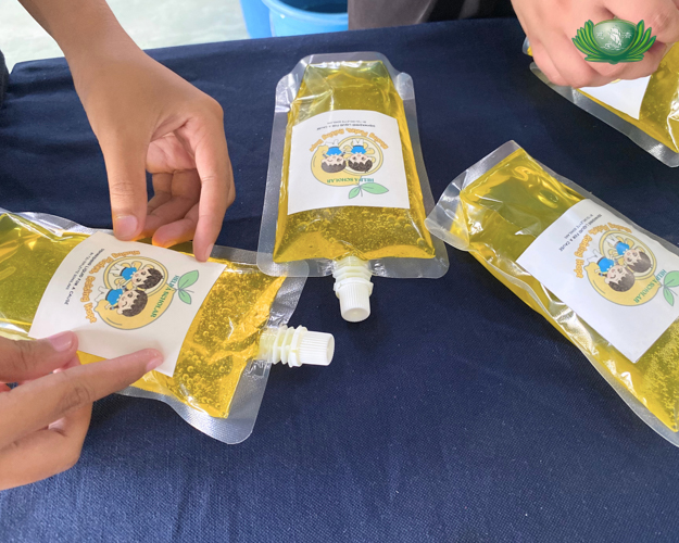 Made with love, these packs of dishwashing liquid were sold to neighboring communities near the Palo Great Love Village.