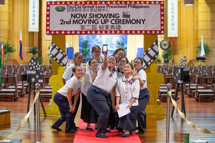 No moving up ceremony is complete without selfies and photos with the preschoolers.