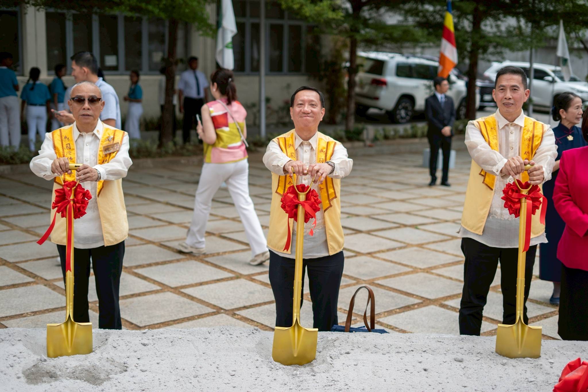 Everybody was invited to participate in symbolic shoveling at the groundbreaking site.